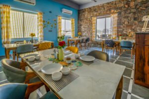 Elegant restaurant interior with floral decor and seating