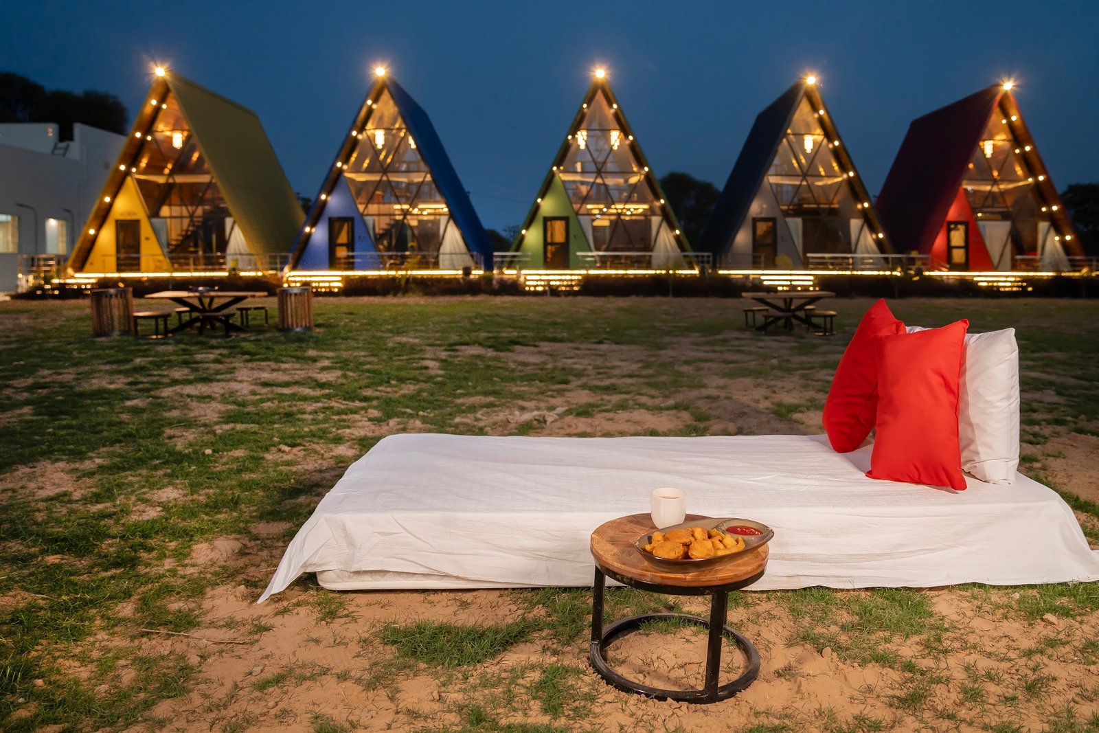 A-Frame cottages glowing at Sunflower Saga