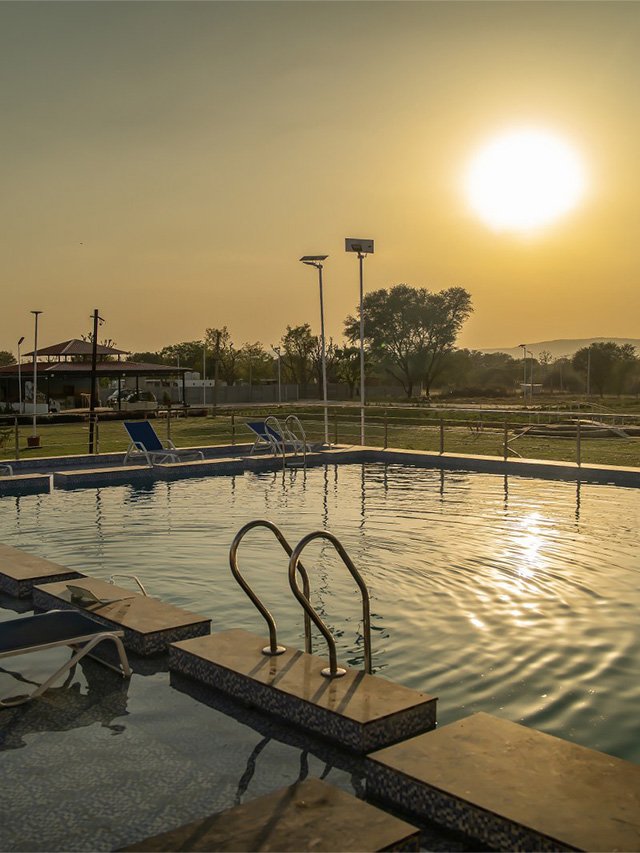 Sunset reflections and calm waters create the perfect beginning to a luxurious countryside escape