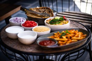 Freshly prepared Indian and multi-cuisine dishes served at Sunflower Saga Jaipur, a resort near the Delhi Jaipur Highway offering memorable dining experiences.